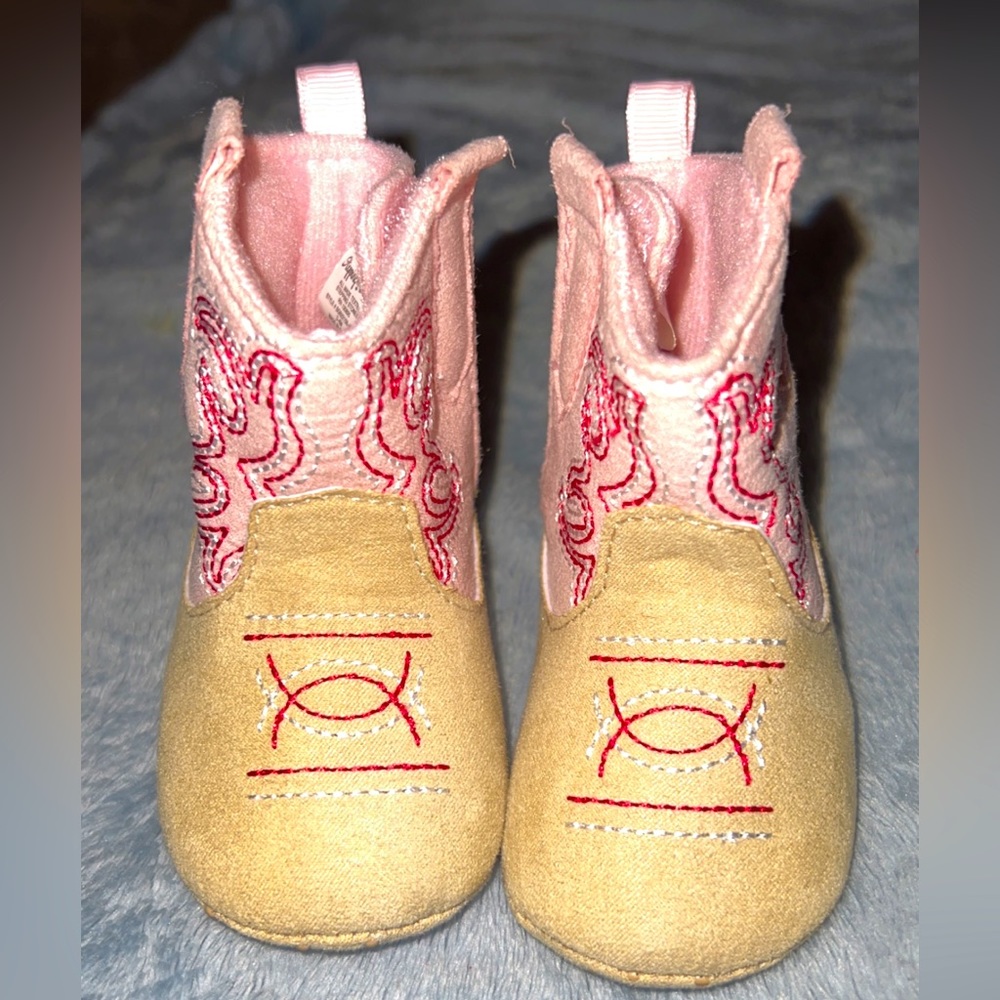 Pink and brown baby cowgirl boots.